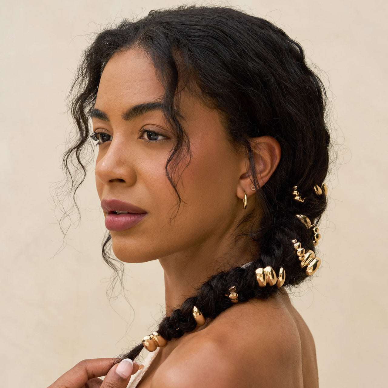 Pins metálicos dorados con forma de poni