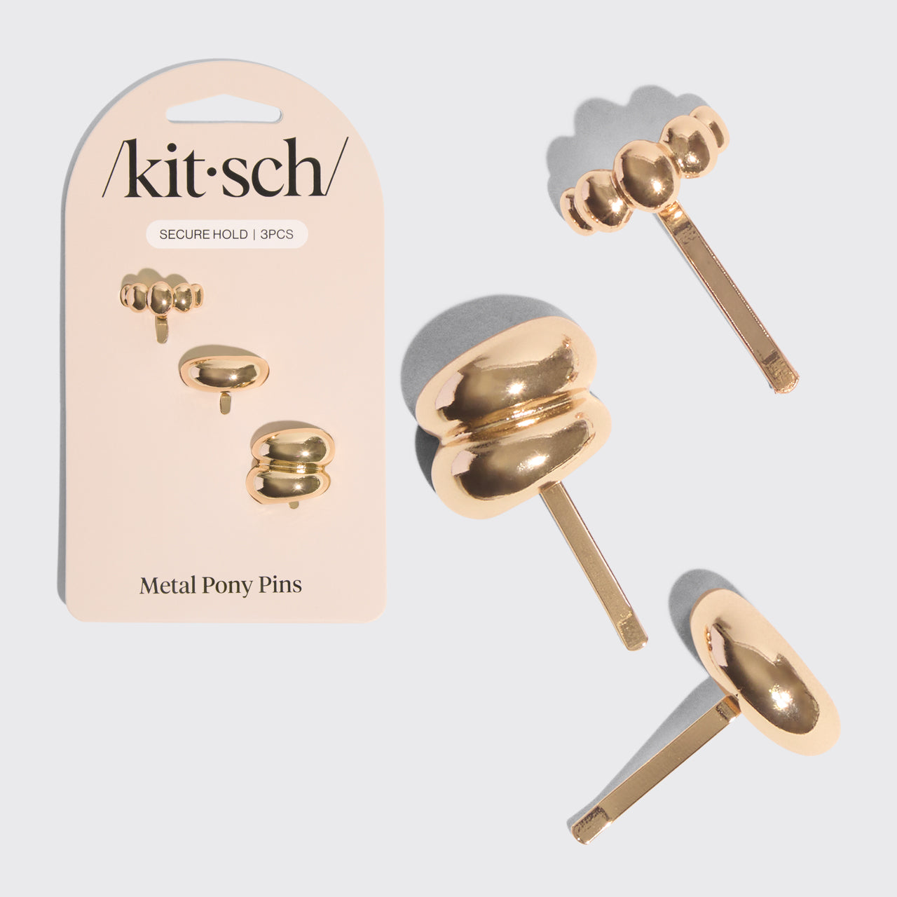 Pins metálicos dorados con forma de poni