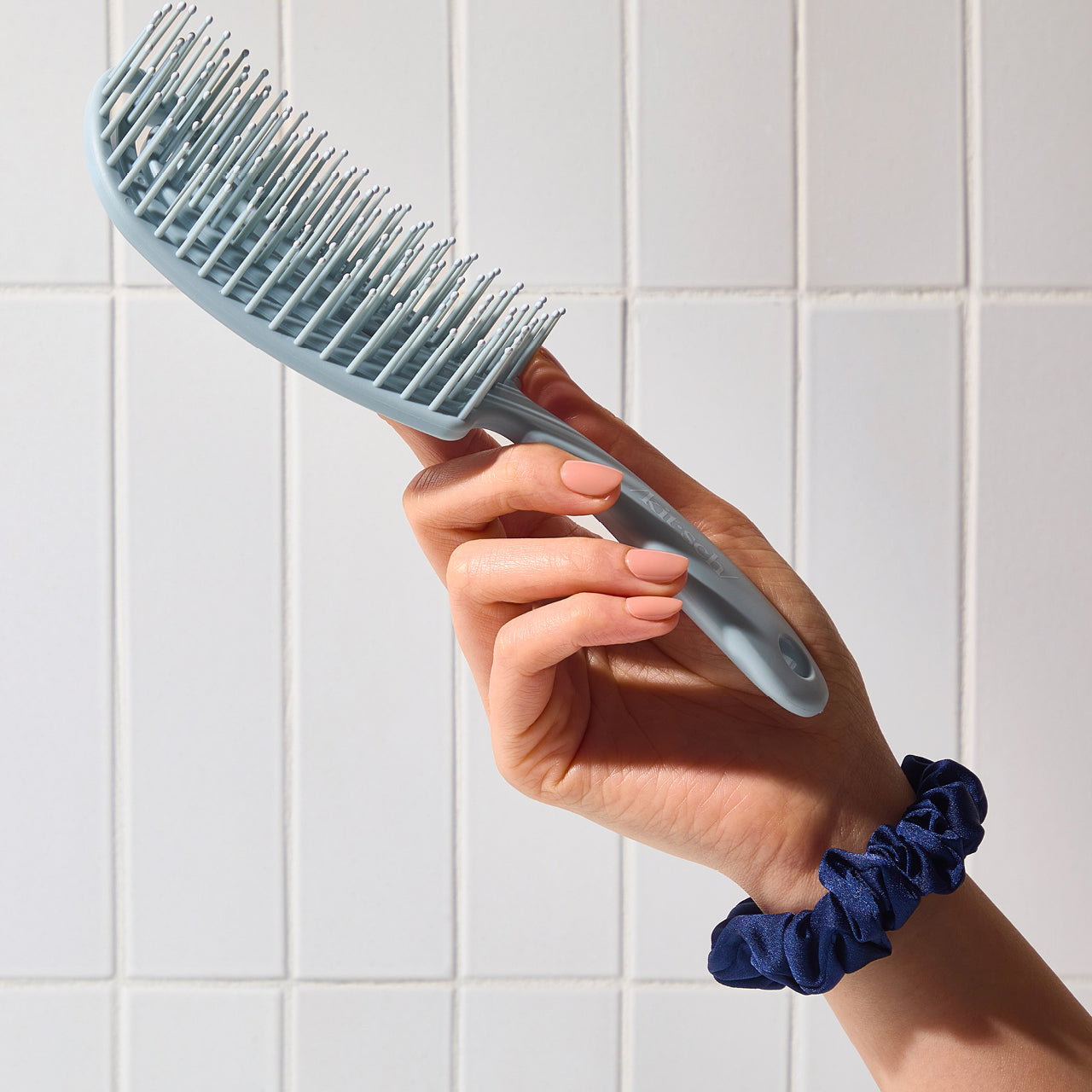 Cepillo desenredante flexible azul bruma