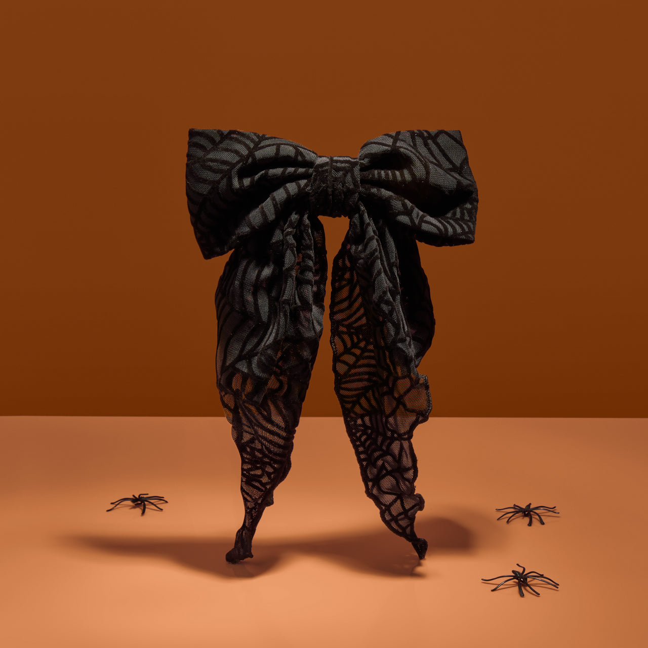 Clip à tête en toile d'araignée