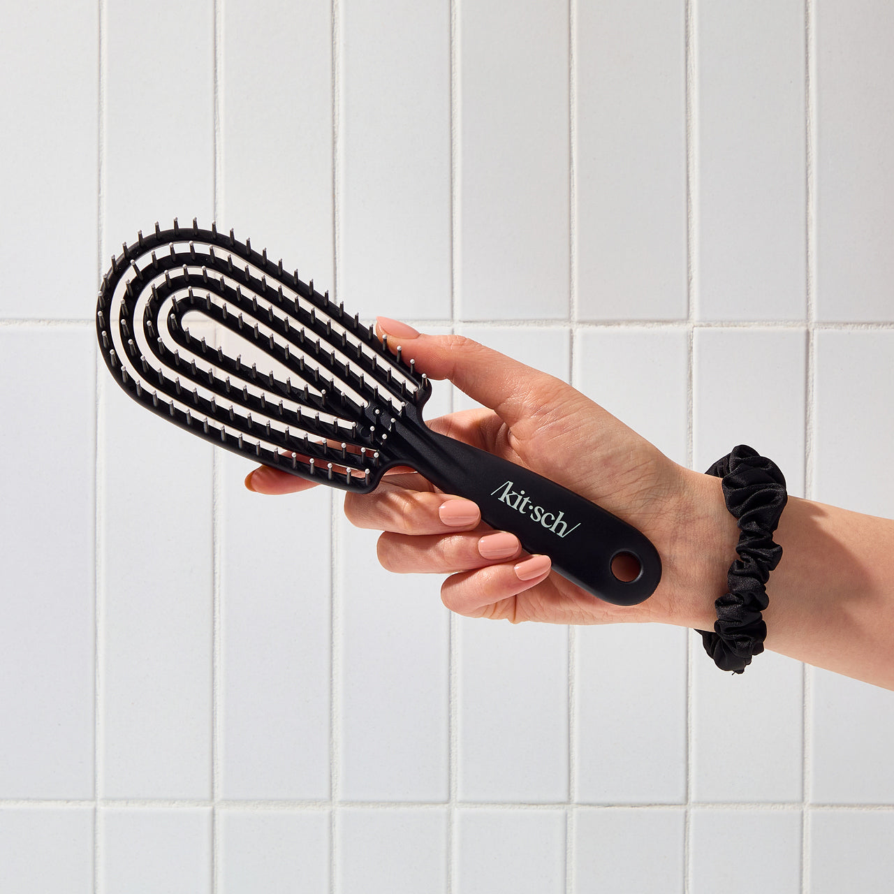 Cepillo desenredante flexible negro