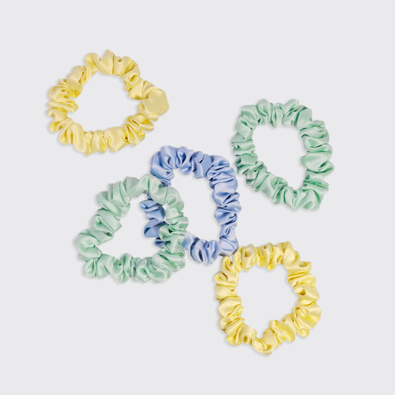 KITSCH Coastal Cottage Multi-color Ruched Satin Scrunchies — flat lay showing all 5 scrunchies spread on white background — butter yellow, lavender blue & sage green coastal color palette — Extra Gentle | 5pcs, silky satin, gentle snag-free hold