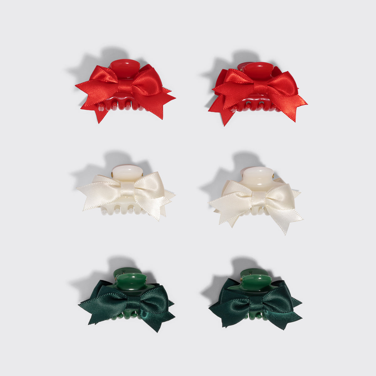 KITSCH Holiday Claw Clips 6pc Set - Mini — the six clips arranged in red, ivory and green pairs — Crafted from recycled plastic — quick touch-ups