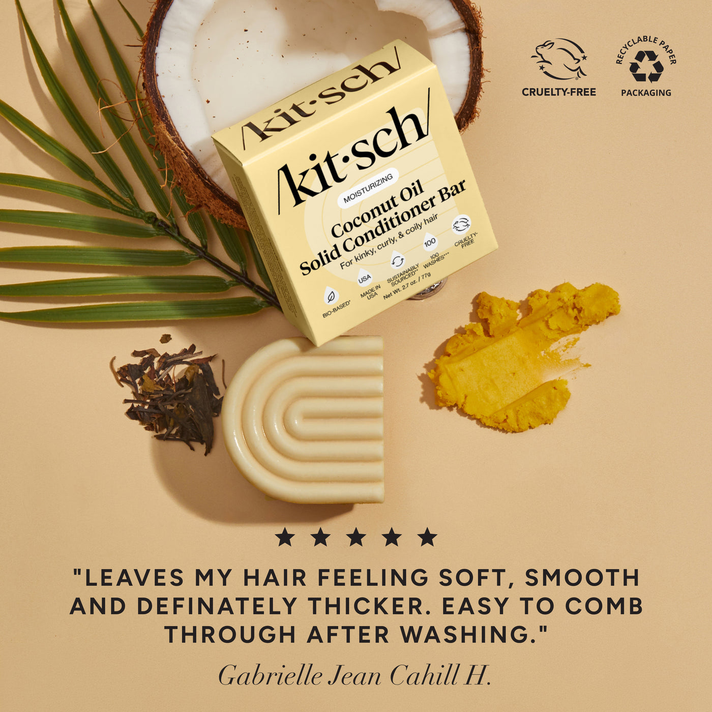 KITSCH Coconut Oil Solid Conditioner Bar — ingredient flat lay on warm tan background with coconut, palm leaf, turmeric powder, and dried herbs — 5-star review: LEAVES MY HAIR FEELING SOFT, SMOOTH AND DEFINATELY THICKER. EASY TO COMB THROUGH AFTER WASHING. — Gabrielle Jean Cahill II — Cruelty-Free | Recyclable Paper Packaging — Formulated with Coconut Oil known to boost hydration