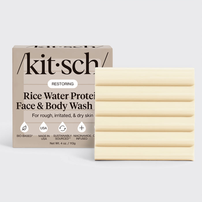 KITSCH Rice Water Protein Restoring Face & Body Wash Bar — hero product shot with /kit·sch/ packaging — cream ribbed bar 4 oz / 113g — Bio-Based, Made in USA, Sustainably Sourced, Niacinamide Infused — For rough, irritated, & dry skin